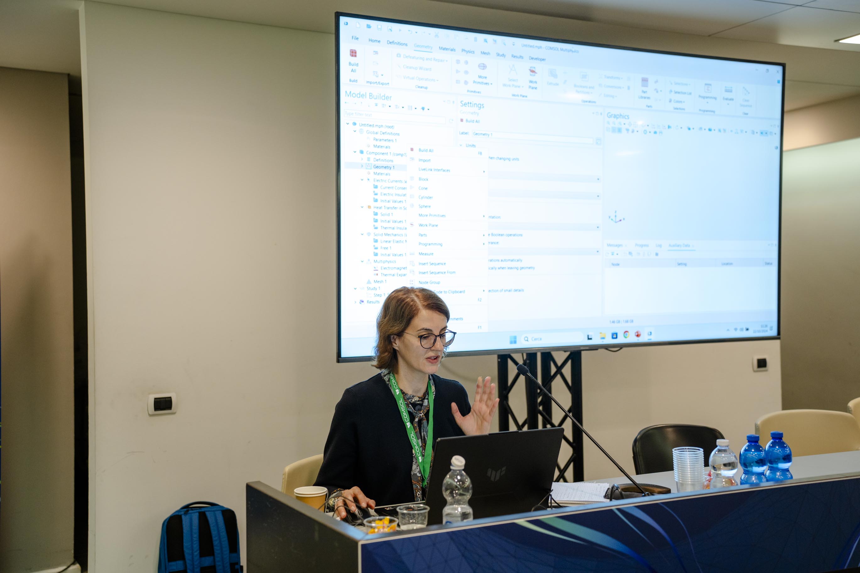 Maria Iuga-Roemer of COMSOL presenting a minicourse.